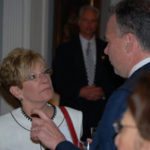 Carolyn speaking with Governor Tim Kaine.